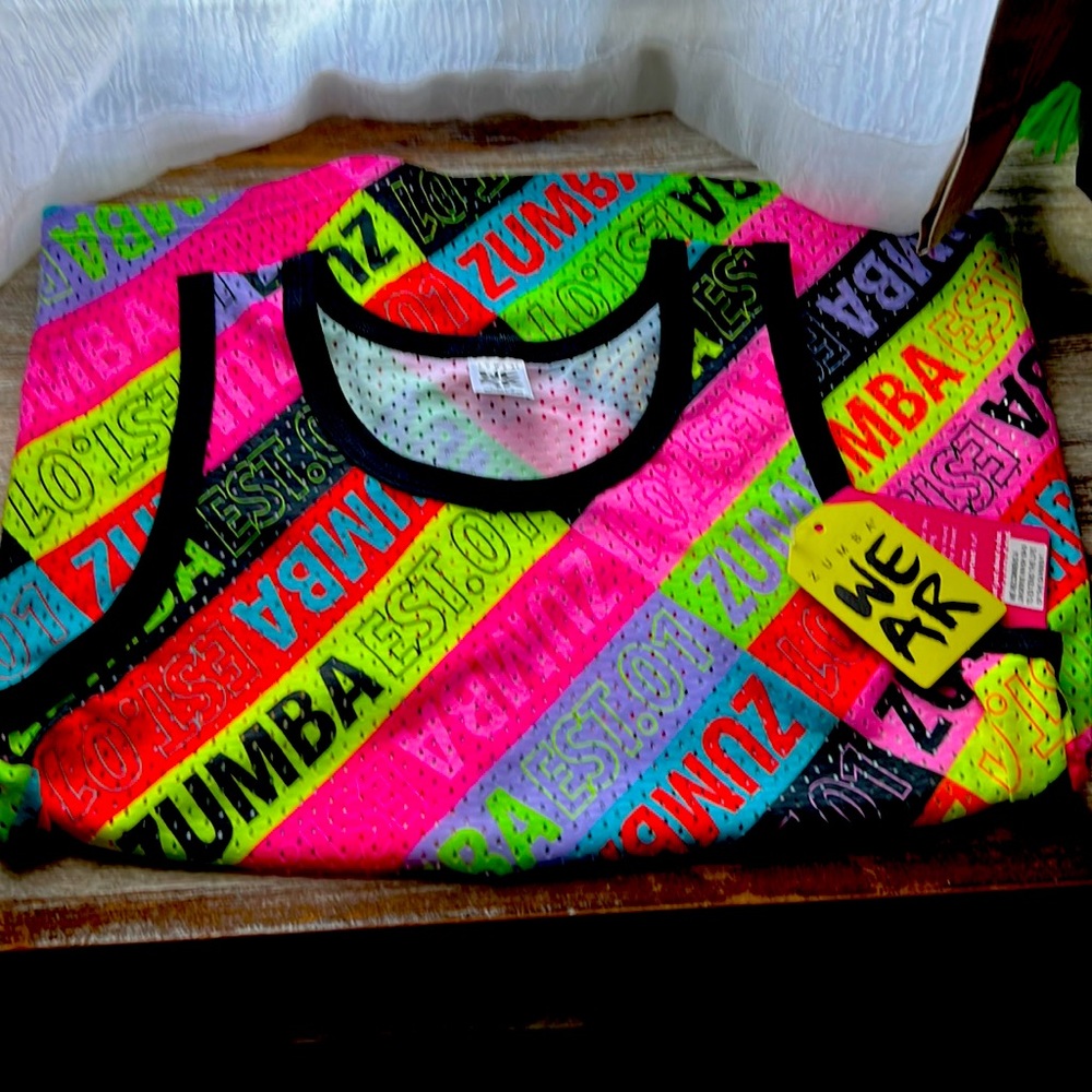 Zumba mesh tank x spicy but really the size is very large for me it is medium😔